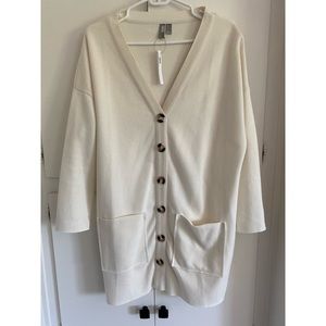 Cream cardigan dress with brown buttons by Asos. Size US 4. New with tag